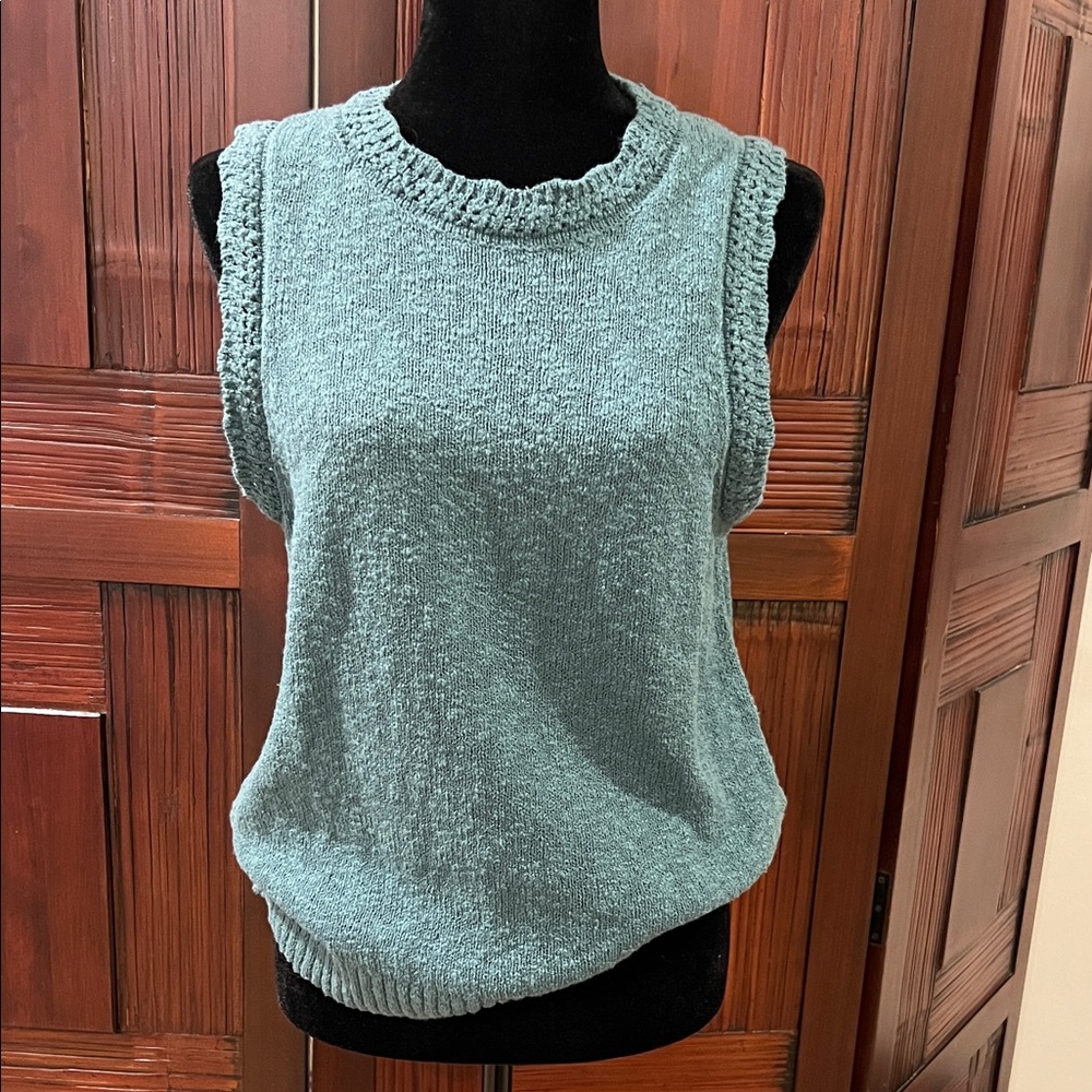 J Crew pullover sleeveless sweater. Decorative details and soft. Never worn.
